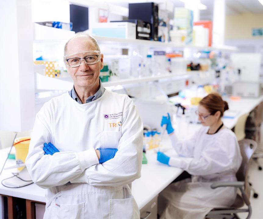 Professor Brandon Wainwright in a white lab coat.